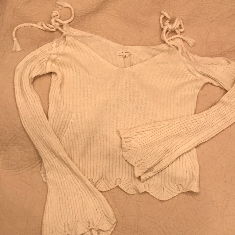 Cold shoulder, bell sleeve sweater.